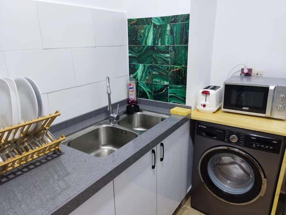Superbe Appartement Avec Parking Gratuit Et Garde داكاغْ المظهر الخارجي الصورة